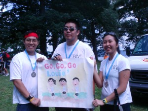 our sign that yuee made! Yuee made this motivational sign for us and held it up while we raced